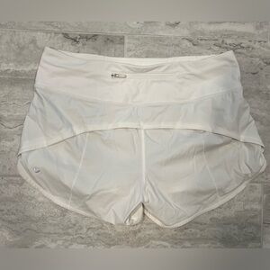 White Lululemon running shorts